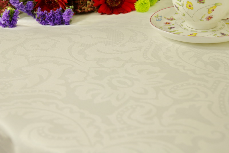 Weiße abwaschbare Tischdecke gemustert Iris Breite 140 cm