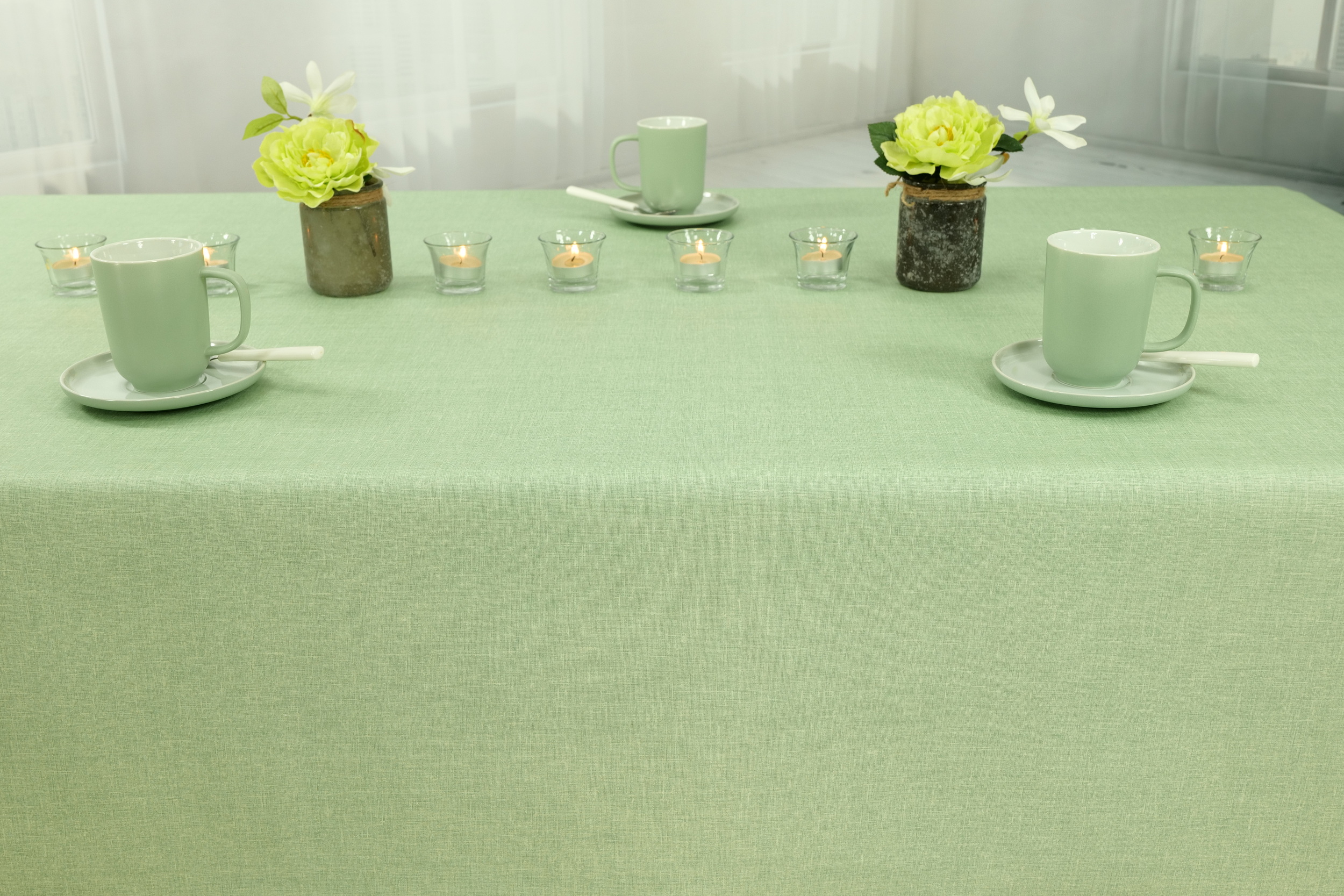 Tischdecke abwaschbar Pistaziengrün uni Tessa Breite 100 cm